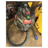 SHOP-VAC WET/DRY VACUUM, BLACK AND RED, W/ HOSE.