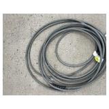 GREY PRESSURE WASHER HOSE W/ METAL FITTINGS.
