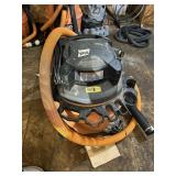 RIDGID WET/DRY SHOP VACUUM, ORANGE HOSE.