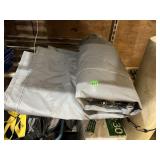 LARGE ROLLED UTILITY TARP, CYLINDRICAL PLASTIC
