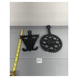 CAST IRON TRIVET, ORNATE WALL HOOK, BLACK FINISH.