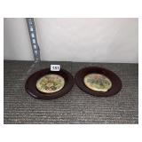 PAIR RUBY RED GLASS PLATES, INSET FLORAL MOTIF.