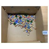 GLASS MARBLES, ASSORTED COLORS, SWIRLED PATTERNS.