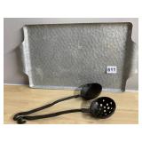 HAMMERED METAL TRAY W/ CAST IRON LADLES.