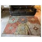 MULTICOLOR MEDALLION PATTERN AREA RUG.