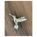 STAMPED 14K GOLD HUMMINGBIRD CHARM PENDANT.