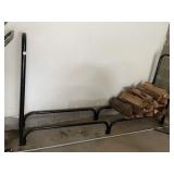 BLACK METAL FIREWOOD RACK, STURDY CONSTRUCTION.