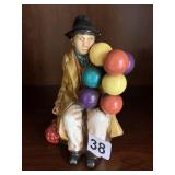 VTG CERAMIC FIGURINE, MAN HOLDING BALLOONS,