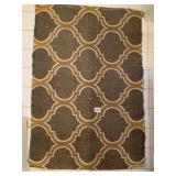 WOVEN AREA RUG, GREY & GOLD QUATREFOIL PATTERN.