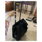 BLACK FABRIC ROLLING TOTE BAG, EXTENDABLE HANDLE.