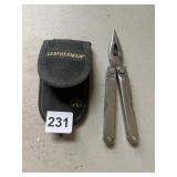 LEATHERMAN STAINLESS STEEL MULTI-TOOL W/ SHEATH.