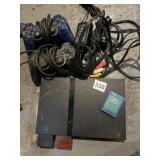 PLAYSTATION AND 2 CONTROLLERS