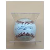 SAMMY SOSA AUTOGRAPHED BASEBALL, IN DISPLAY CUBE.
