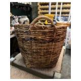 WICKER BASKET FILLED W/ ASSORTED WINE CORKS.