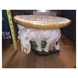 VTG PORCELAIN ELEPHANT PLANT STAND W/ ROUND TOP.