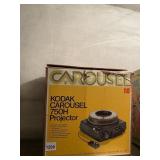 KODAK CAROUSEL 750H PROJECTOR, IN ORIGINAL BOX.