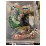 ASSORTED DECORATIVE RIBBONS AND SHREDDED GIFT