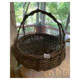 VTG WOVEN WICKER BASKET W/ SWING HANDLE.