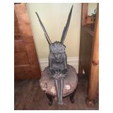 BRONZE-TONE FAIRY STATUE, WINGED FIGURE SEATED ON