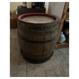 VTG WOODEN BARREL, RED PAINTED RIM, METAL HOOPS.