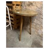 OVAL SIDE TABLE, GLASS TOP, WOOD LEGS.