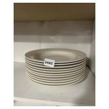 STACK OF CREAM-COLORED PORCELAIN SOUP BOWLS.
