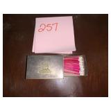 VTG METAL MATCHBOX HOLDER W/ CREST, FILLED W/