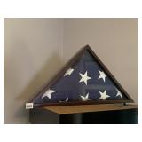 AMERICAN FLAG IN TRIANGULAR WOODEN DISPLAY CASE,