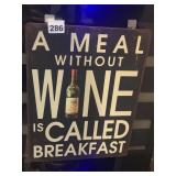 METAL WALL SIGN, "A MEAL W/O WINE IS CALLED