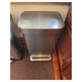 SIMPLEHUMAN STAINLESS STEEL STEP TRASH CAN.