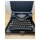 VTG PORTABLE TYPEWRITER IN HARD CASE.
