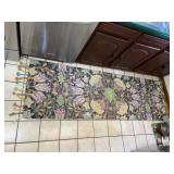 WOOL AREA RUG, FLORAL PATTERN, FRINGED ENDS.