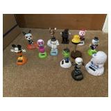 ASSORTED SOLAR-POWERED BOBBLEHEAD FIGURES (11),