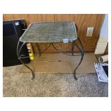 WROUGHT IRON AND WICKER STOOL W/ CURVED LEGS.