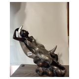BRONZE-TONE FIGURINE, WOMAN ON CRESCENT MOON,
