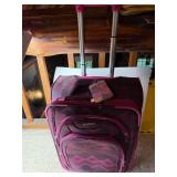 AMERICAN TOURISTER UPRIGHT ROLLING SUITCASE,