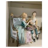 PORCELAIN COURTSHIP FIGURINE, COUPLE ON SETTEE,