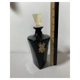 BLACK GLASS DECANTER, TRIANGULAR FORM, AMBER