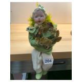 BISQUE DOLL, CHILD FIGURE, FELT CLOTHING, GREEN