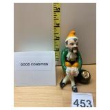BELLEEK PORCELAIN LEPRECHAUN FIGURINE, SEATED W/