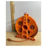 ORANGE PLASTIC HOSE REEL, HAND-CRANK OPERATION,