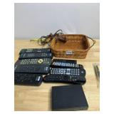 ASSORTED TV REMOTE CONTROLS, WICKER BASKET,