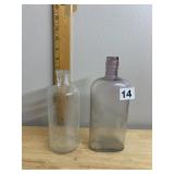 CLEAR GLASS BOTTLES, EMBOSSED FLY-TOX, ROUNDED