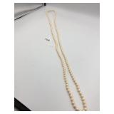 UNMARKED CREAM-COLORED BEAD NECKLACE, LONG OPERA