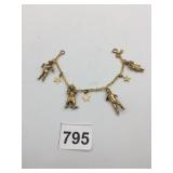 GOLD-TONE METAL CHARM BRACELET, WIZARD OF OZ