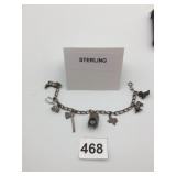 STERLING SILVER CHARM BRACELET, ASSORTED THEMED