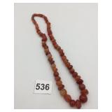 CARNELIAN BEADED NECKLACE, FACETED AND ROUND