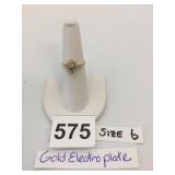 GOLD ELECTROPLATE RING, CLUSTER SETTING, CLEAR