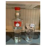 SMIRNOFF VODKA NUTCRACKER BOTTLE, CLEAR GLASS,