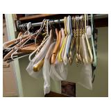 ASSORTED CLOTHES HANGERS, PLASTIC, WOOD, AND